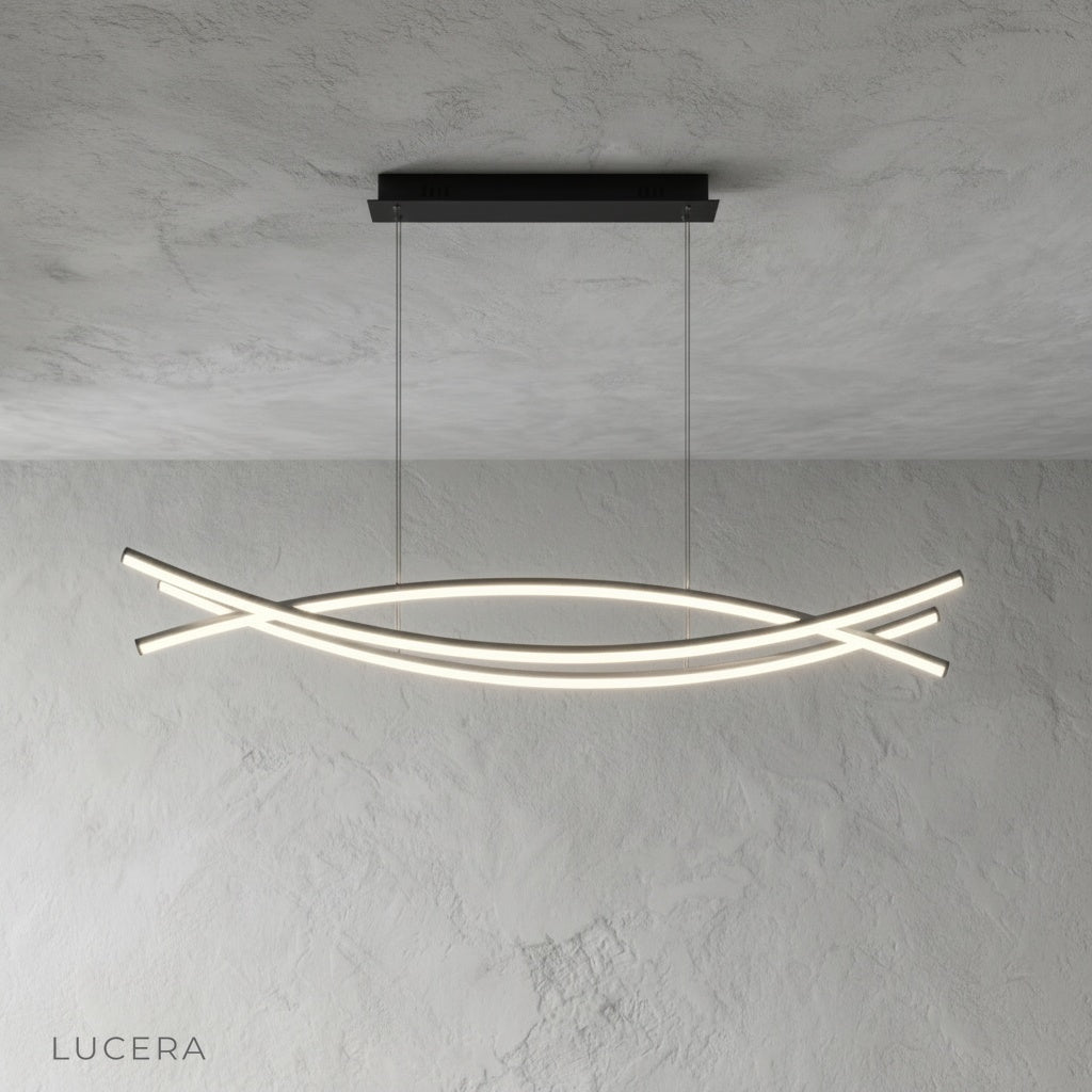 Eterno Chandelier hanging over dining table with soft diffused light in contemporary setting