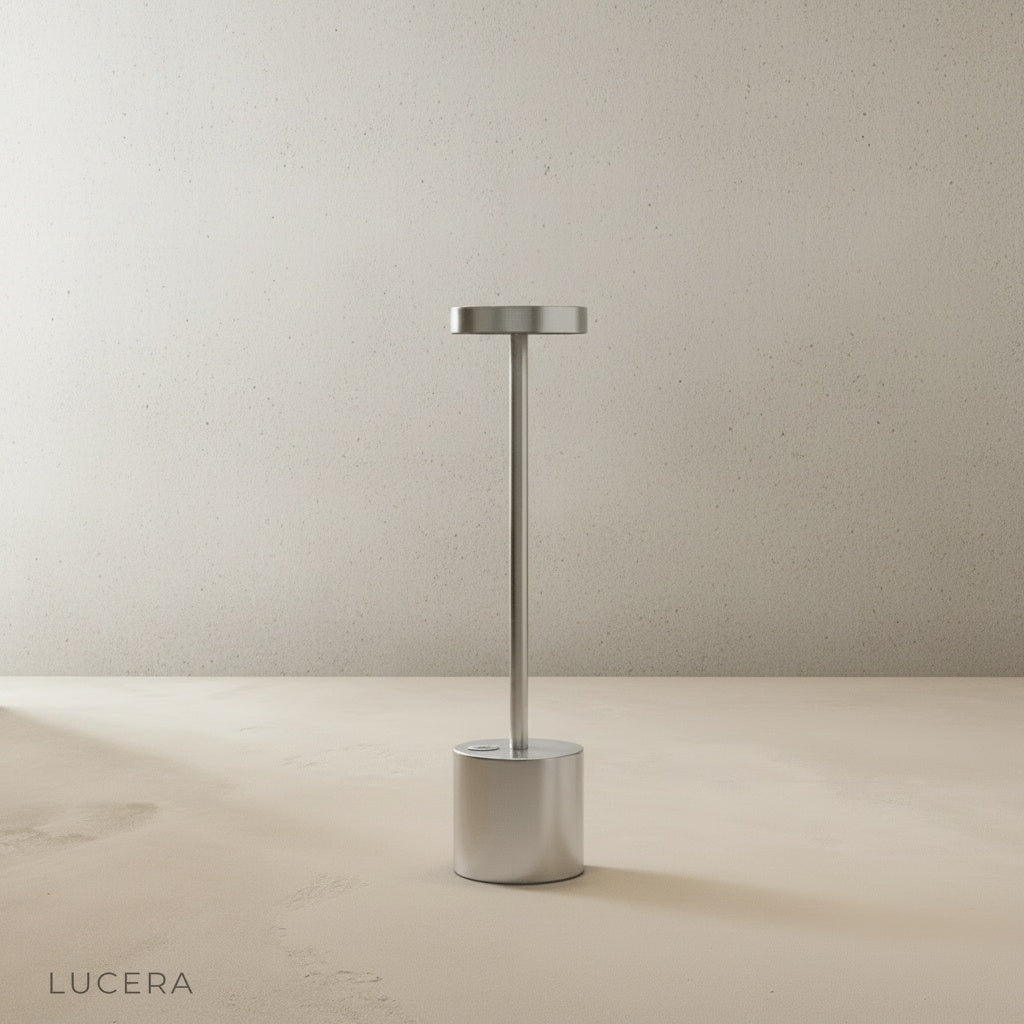 Sinkhole Table Lamp casting soft ambient glow on dark console at night