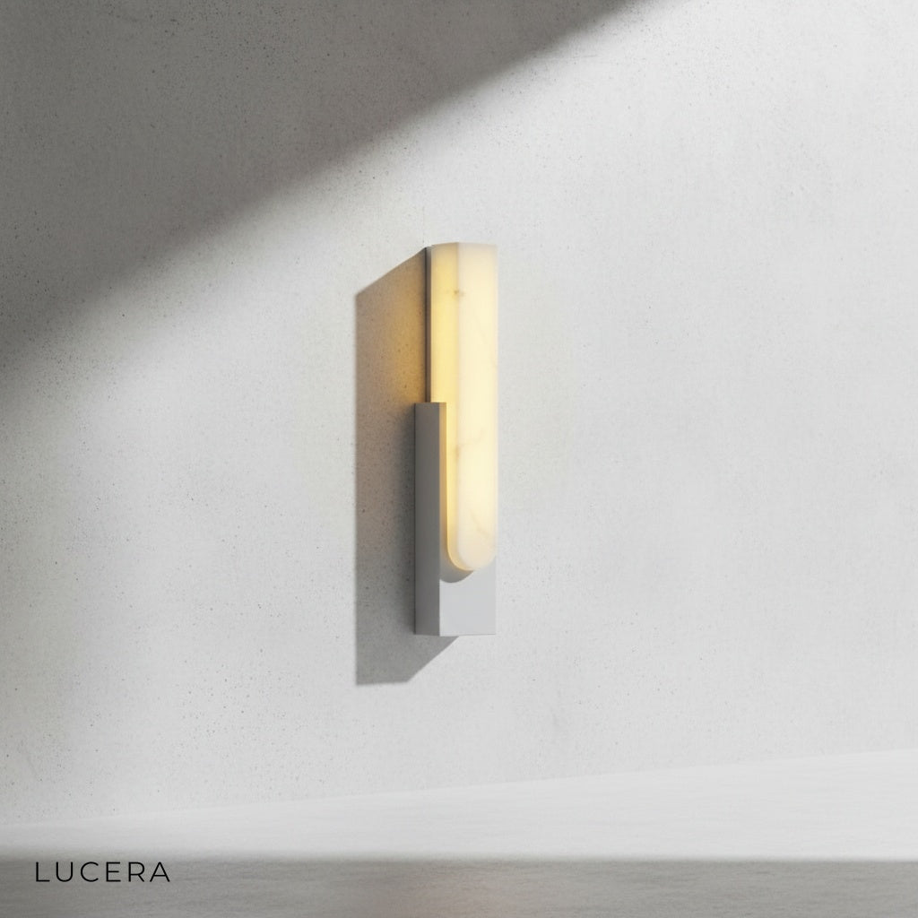 detail shot of Rumore lamp's sleek rectangular silhouette against wall