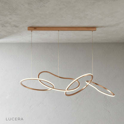artistic ambient shot of Yakitori LED chandelier in a gallery-like space with dim lighting