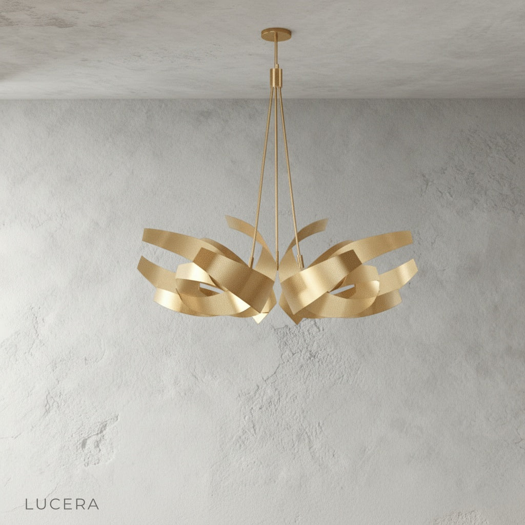 Incanto Chandelier in polished silver finish suspended from ceiling in minimalist interior