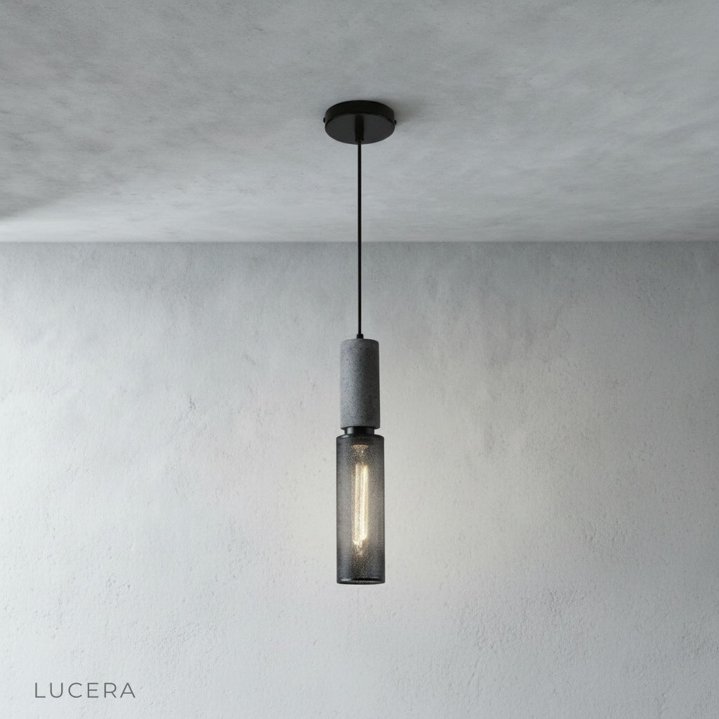 brushed gold Pontiff pendant light hanging in pairs above modern kitchen island