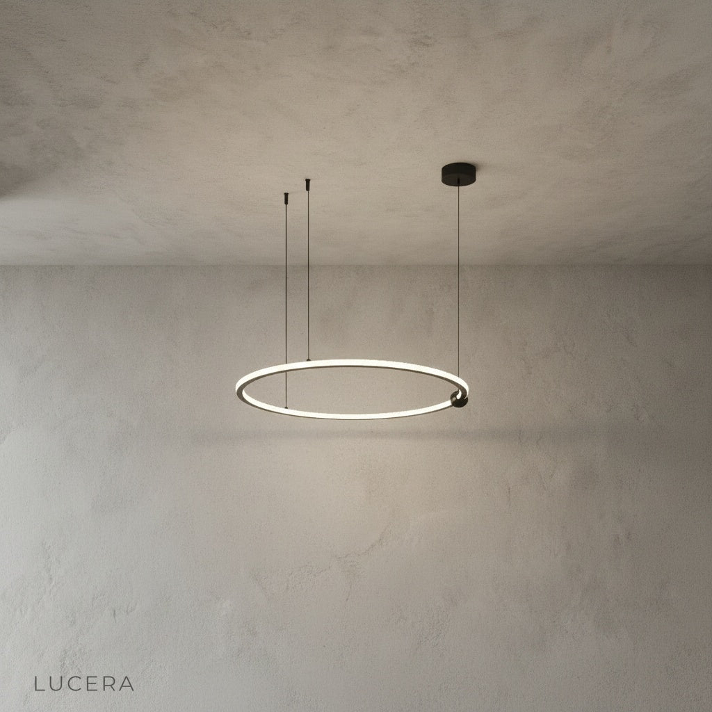 Vaughn Chandelier glowing warm light in contemporary dining room with wooden table