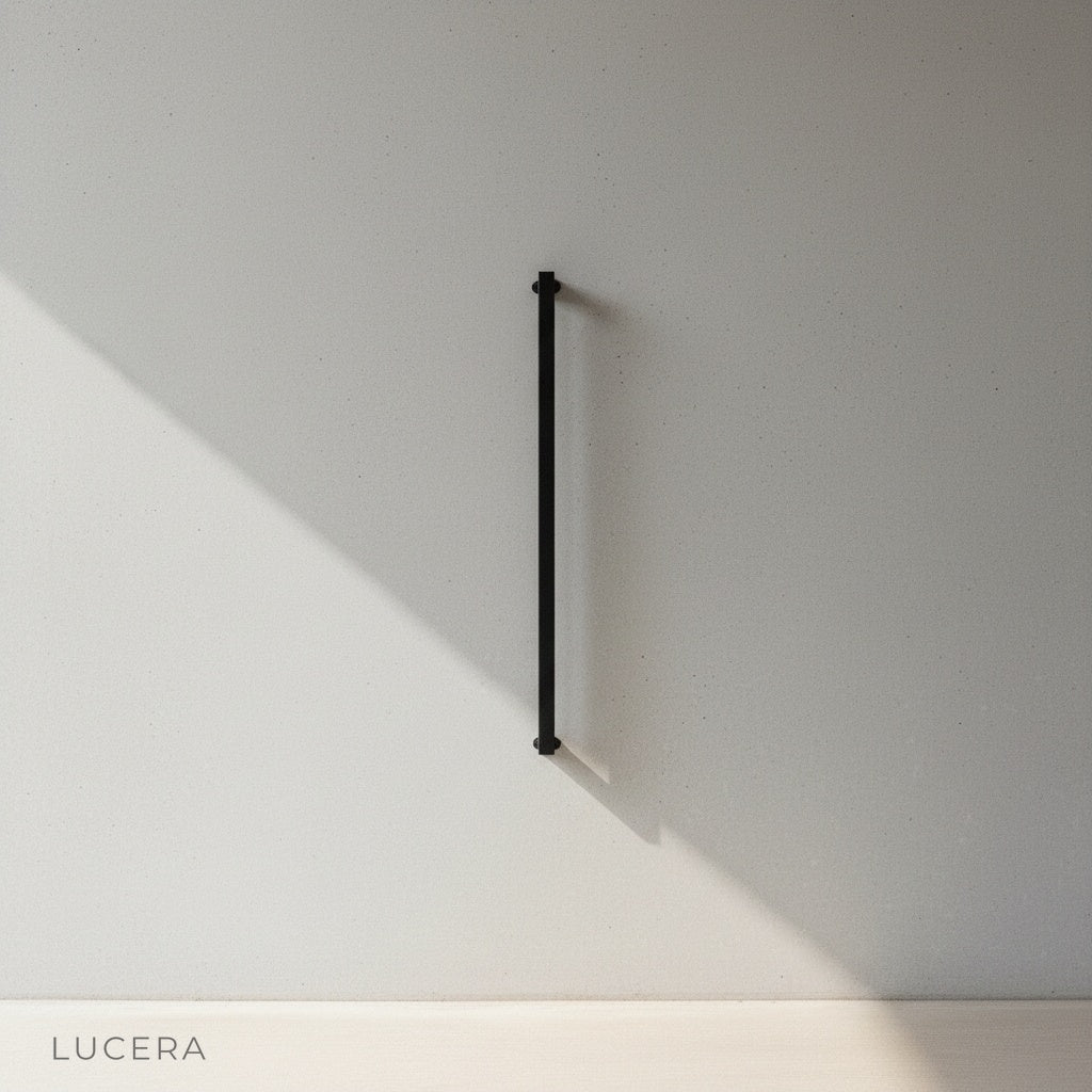 studio view of matte black metal outdoor fixture with frosted glass panel