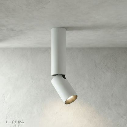 matte black Bewitch ceiling light with five cylindrical heads arranged in a linear row
