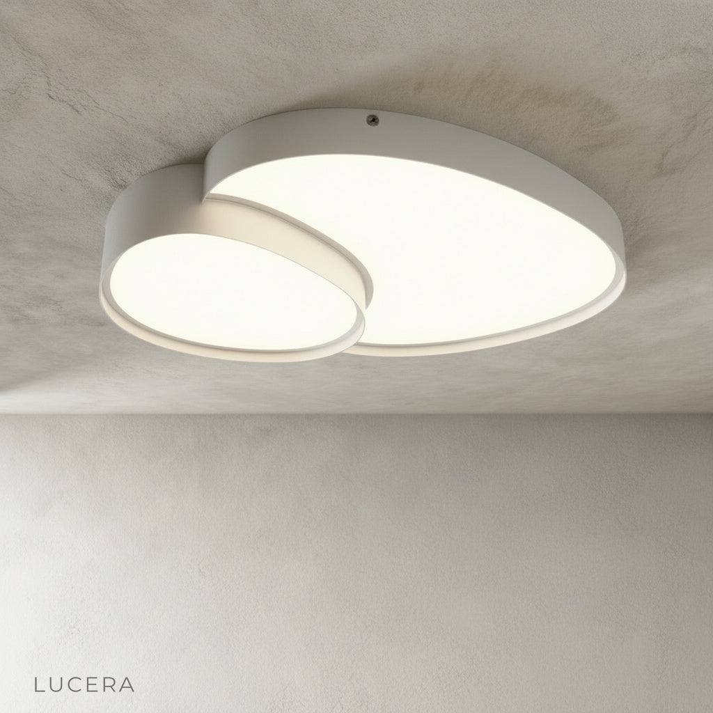 Yielding ceiling light with remote control dimming in an elegant dining area at dusk