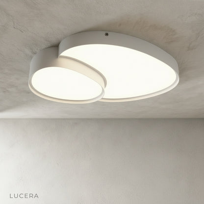 Yielding ceiling light with remote control dimming in an elegant dining area at dusk