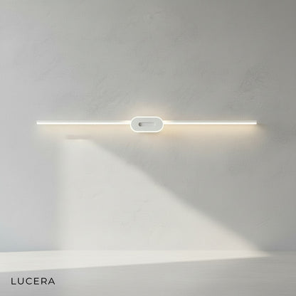 white Calando LED wall lamp casting cool 6000K light in minimalist spa-like bathroom
