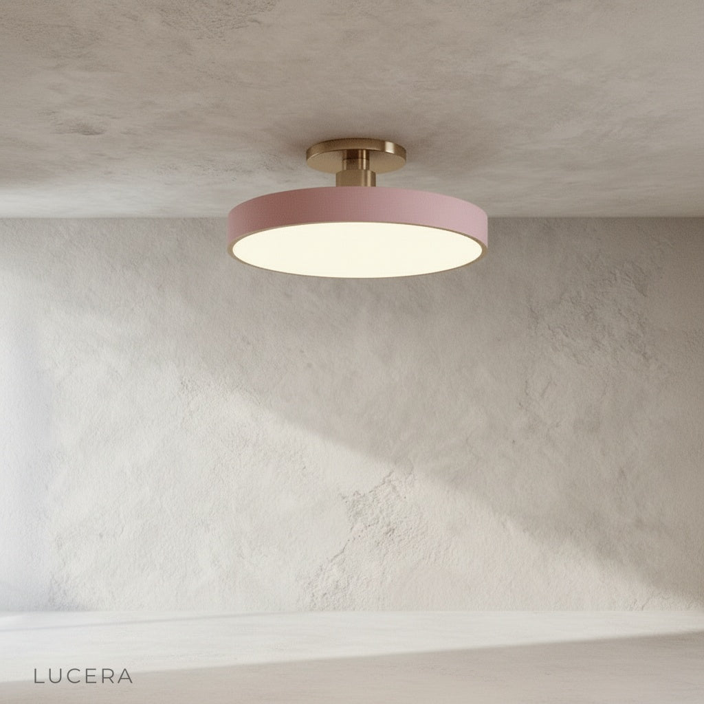 Alizarin ceiling light in a bright bedroom with neutral linen bedding and soft daylight