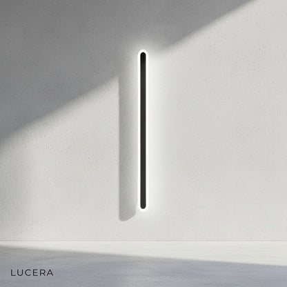 Studio view of Diminuendo lamp with light off showing transparent acrylic panel