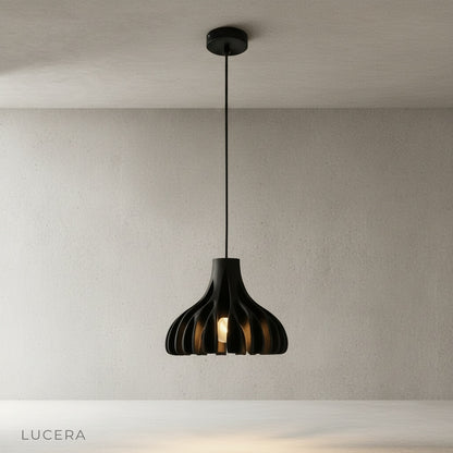 Thibault pendant light glowing softly in entryway foyer at dusk