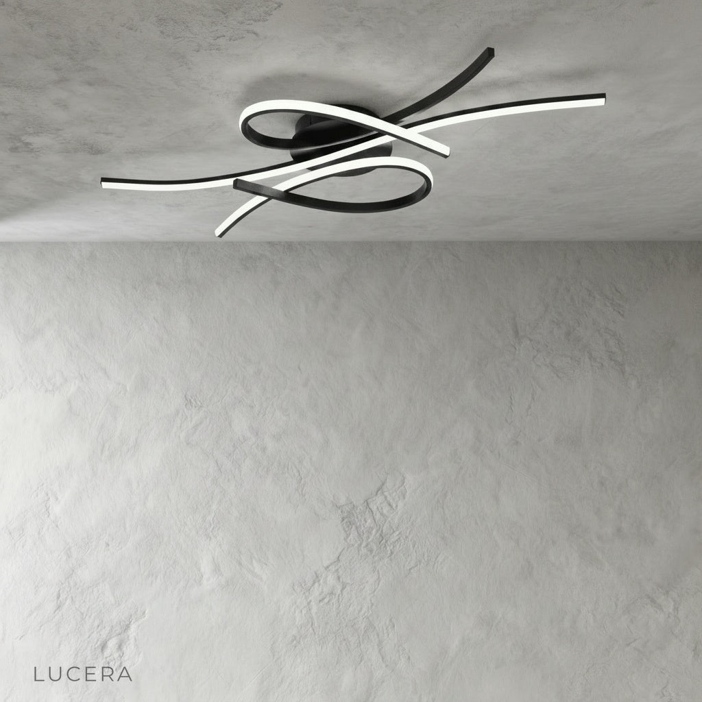 minimalist ceiling light with fluid curved LED lines in neutral interior