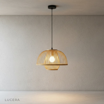 rattan pendant light with vintage charm styled above rustic farmhouse dining table