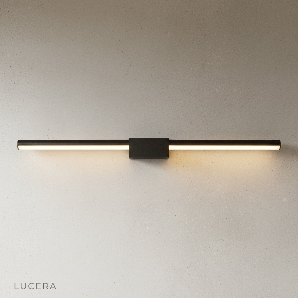 Fiamma wall lamp illuminating a cozy bedroom bedside with warm glow