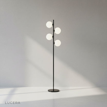 Black and white minimalist interior with Vaporous Floor Lamp casting soft ambient glow