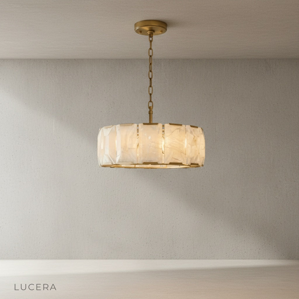 Vivid Round Alabaster Chandelier lit from within showing warm glow through stone panels