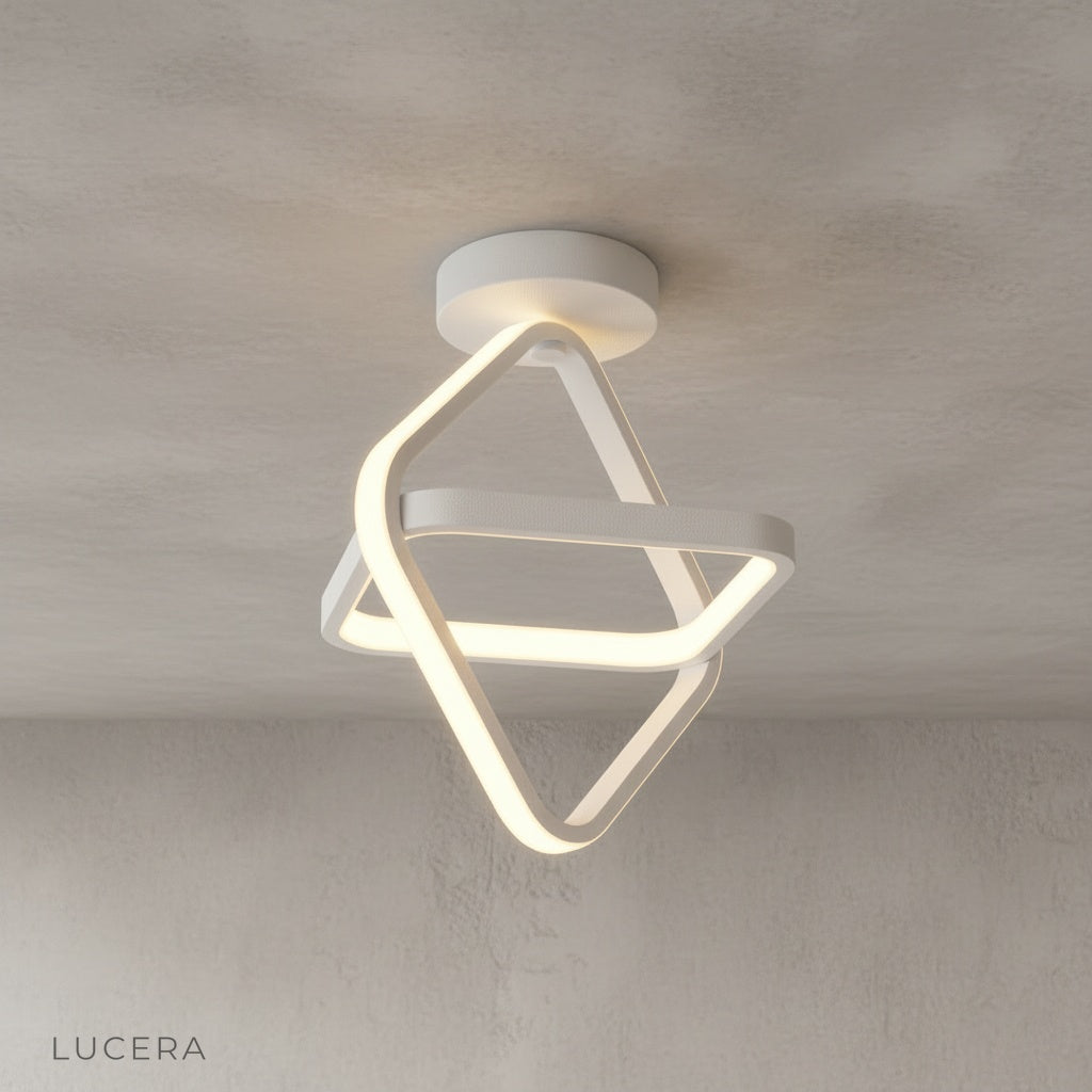 Ultramarine ceiling light in warm ambient light above wooden console table