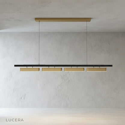 Fiorella Chandelier with opal diffusers lit in hallway showing horizontal silhouette against wall