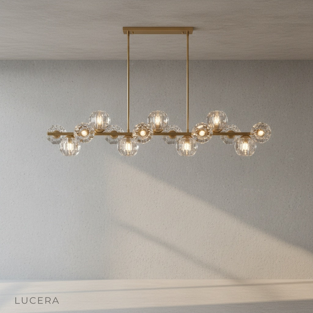 Unisono Linear Chandelier with warm ambient light in cozy minimalist bedroom