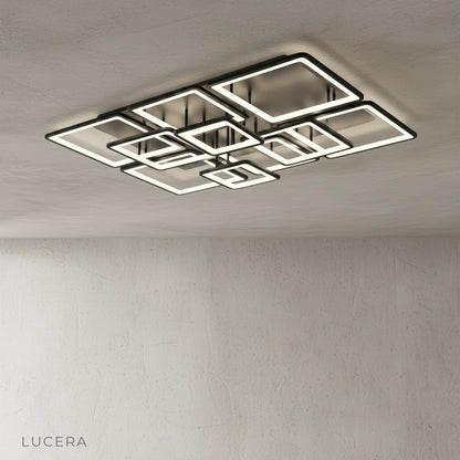 Barolo ceiling light in dining room setting casting even light over wooden table