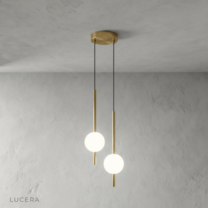 Warm evening ambiance with Fjord pendant light above bedside table