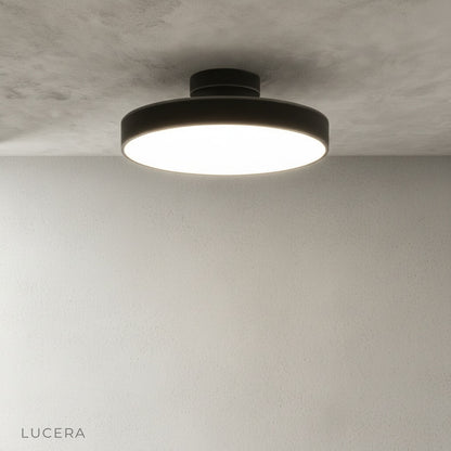 Talisman ceiling light over dining table creating cozy evening atmosphere