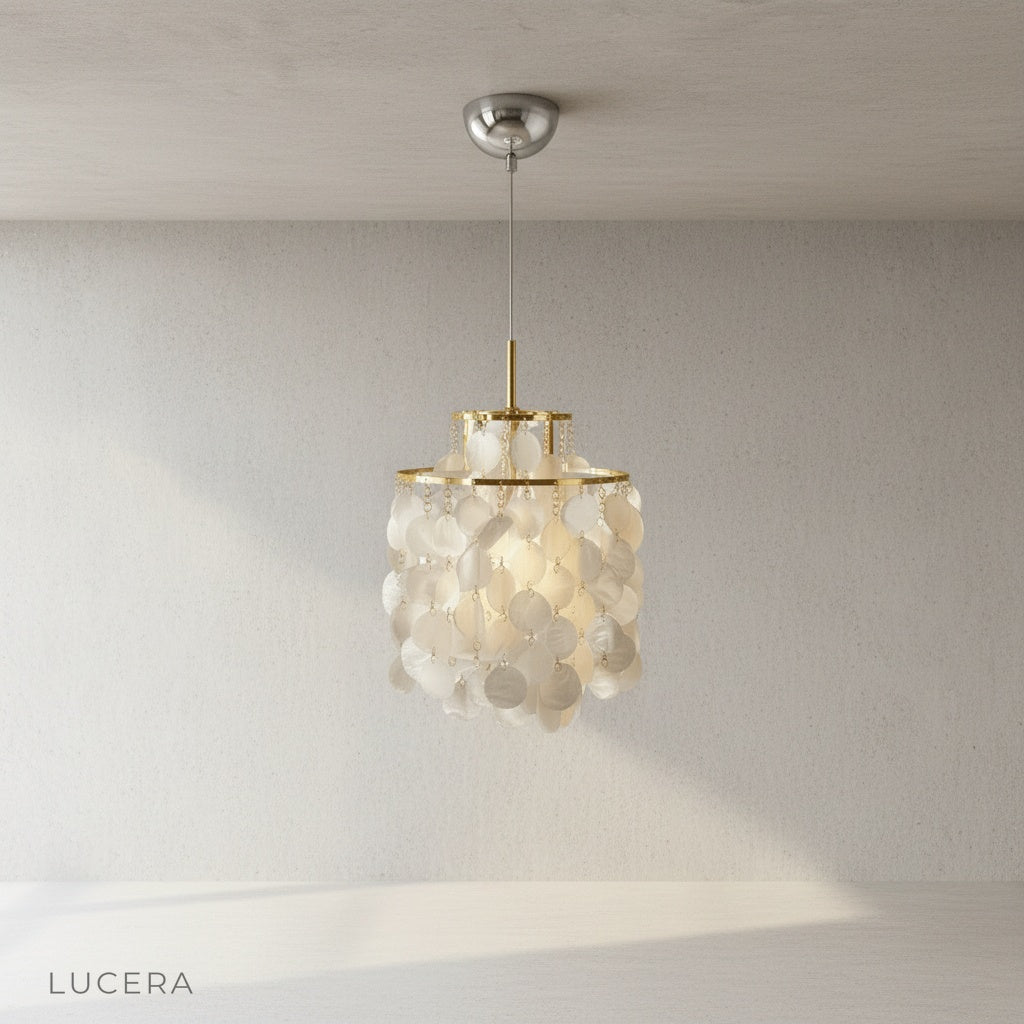 Zwing Chandelier detail shot of shell layers casting intricate shadows on white ceiling