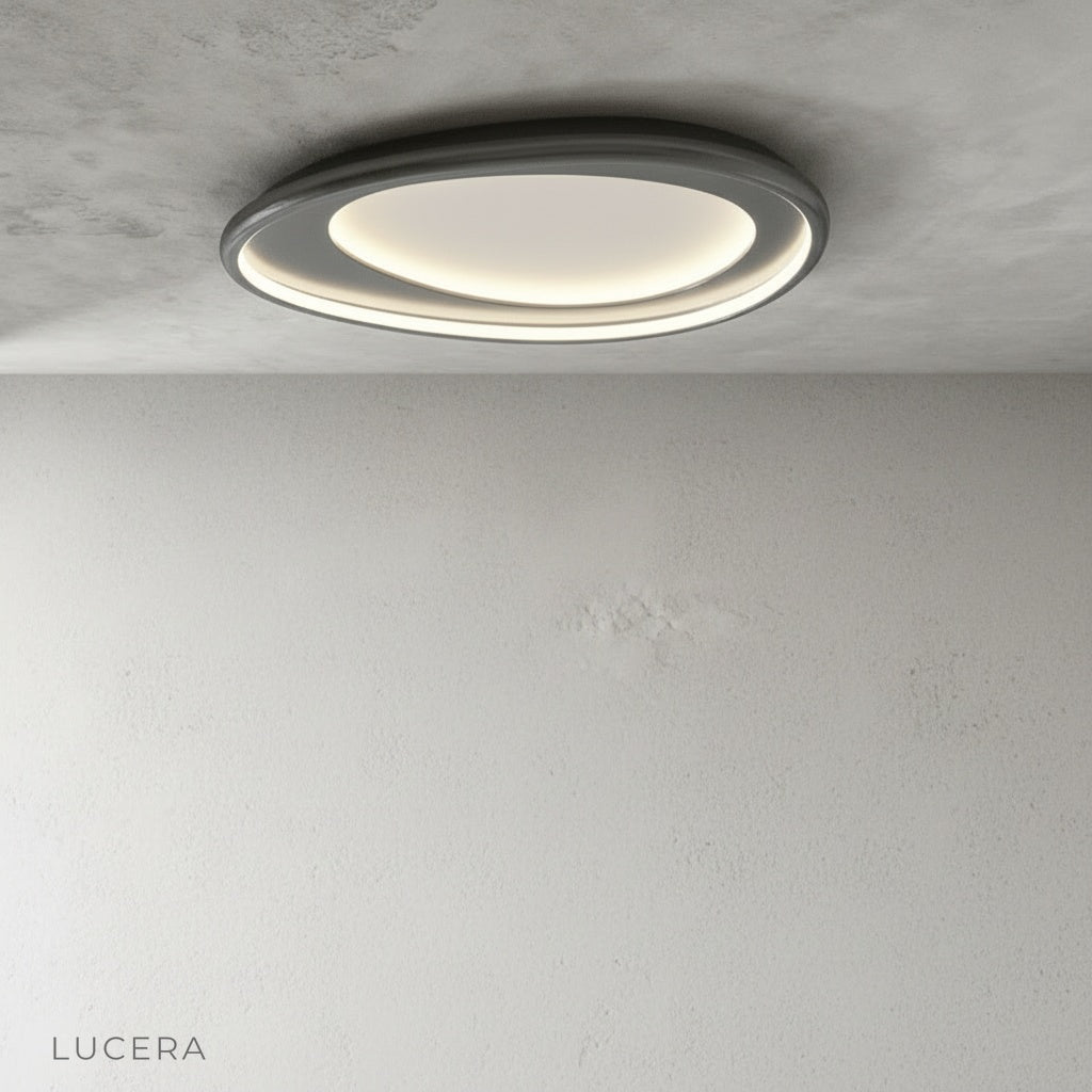 Tantalus ceiling light white chrome finish against dark wall for contrast