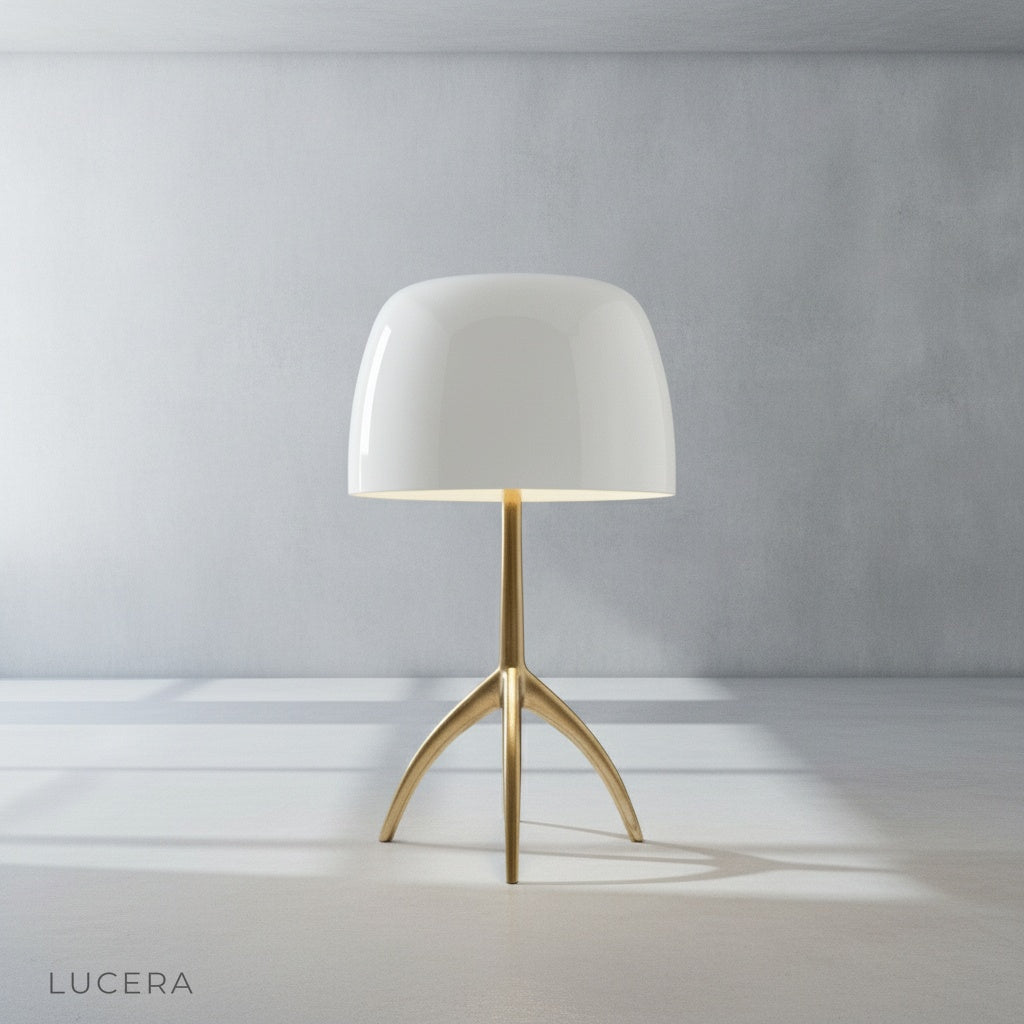 Detail shot of Albescent Table Lamp tripod base joints and metal finish against a neutral wall