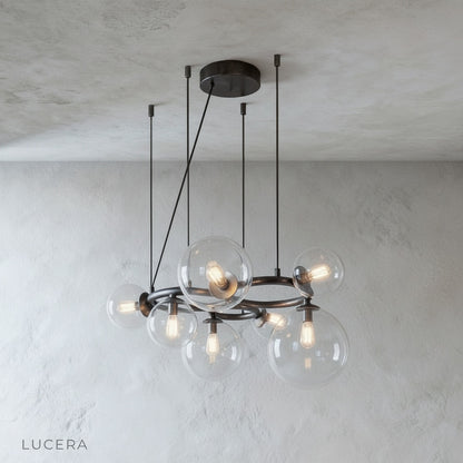Detail of Grenache chandelier metal frame joint and glass sphere attachment