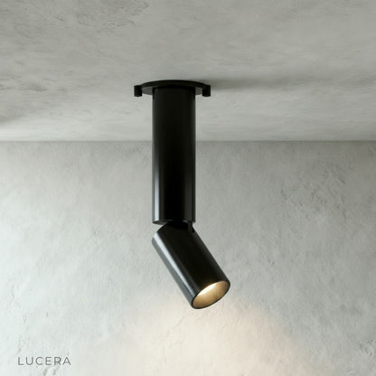 detail shot of Bewitch ceiling light wiring and mounting plate against white ceiling