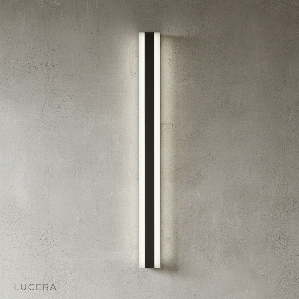 black outdoor wall light above modern concrete bench in minimalist garden setting