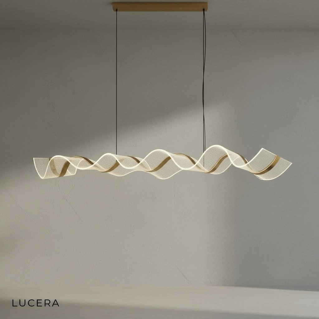 Close-up of gold stainless steel wave arms and acrylic panels on Od Wave chandelier