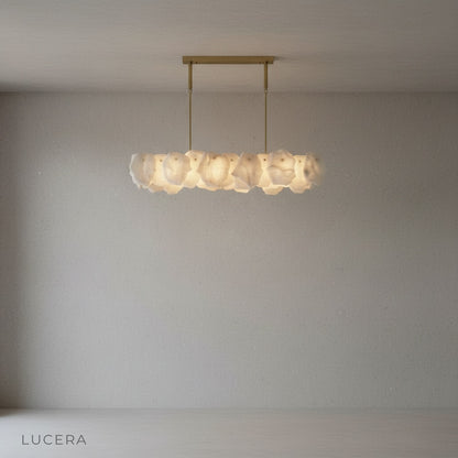 Copper and alabaster pendant chandelier in ambient evening lighting