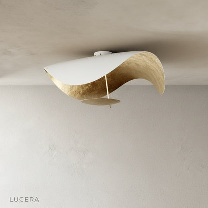 Xenial ceiling lamp in lounge with sculptural form and soft glow