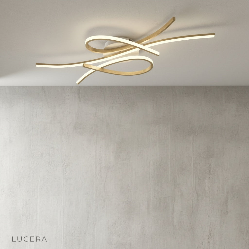 sculptural white and silver LED fixture mounted on modern ceiling