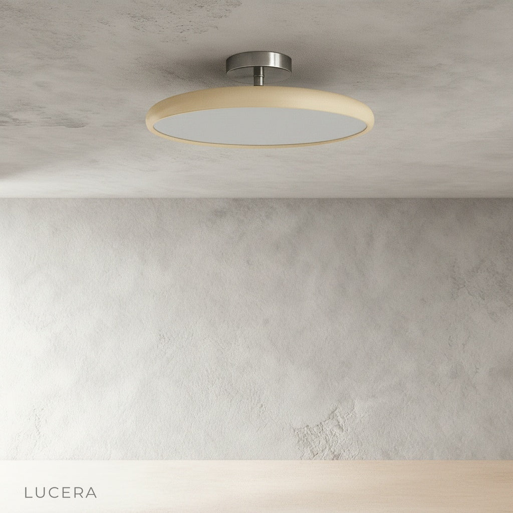 Jubilate ceiling light warm ambient glow in cozy living room at dusk