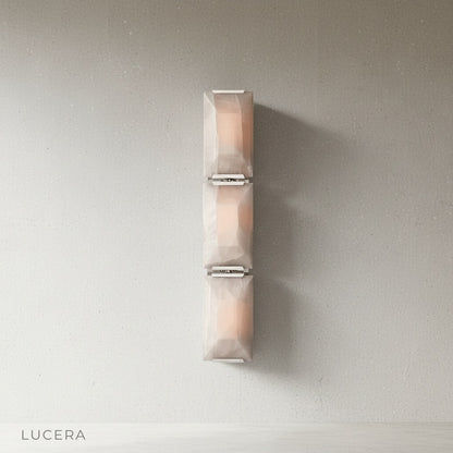 Haut-Médoc wall lamp illuminating hallway with soft ambient evening glow