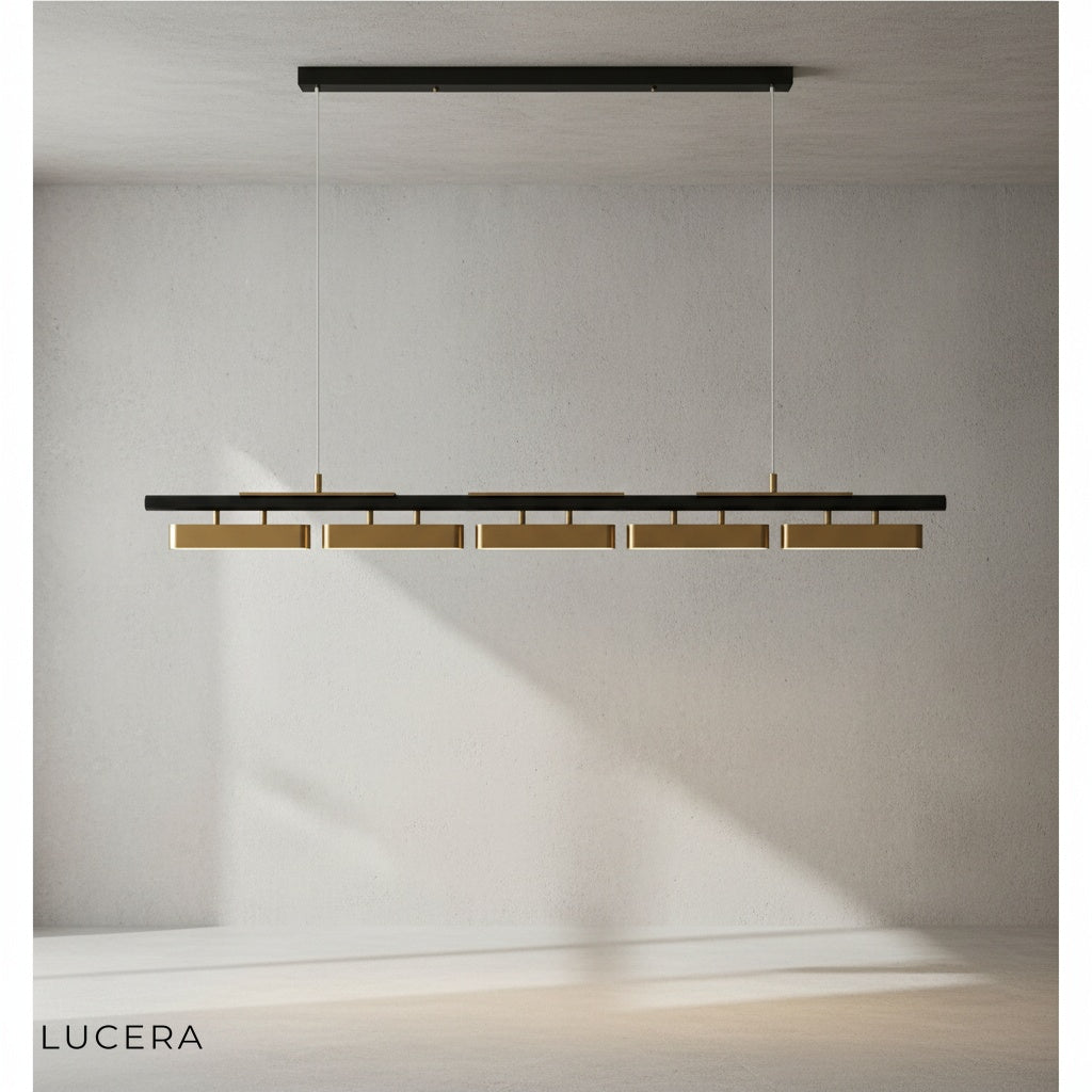 Oskar LED chandelier with gold accent finish in a modern living room near a neutral sofa