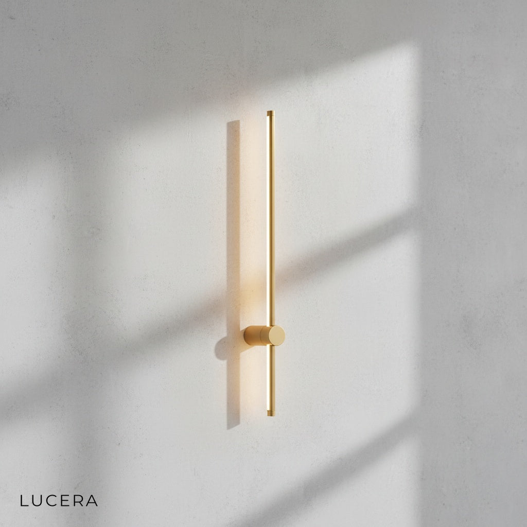 Rinforzando minimalist wall light casting warm glow in bedroom