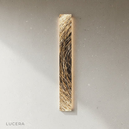 Vela Steel Illuminated Art detail of warm light diffusion through steel perforations