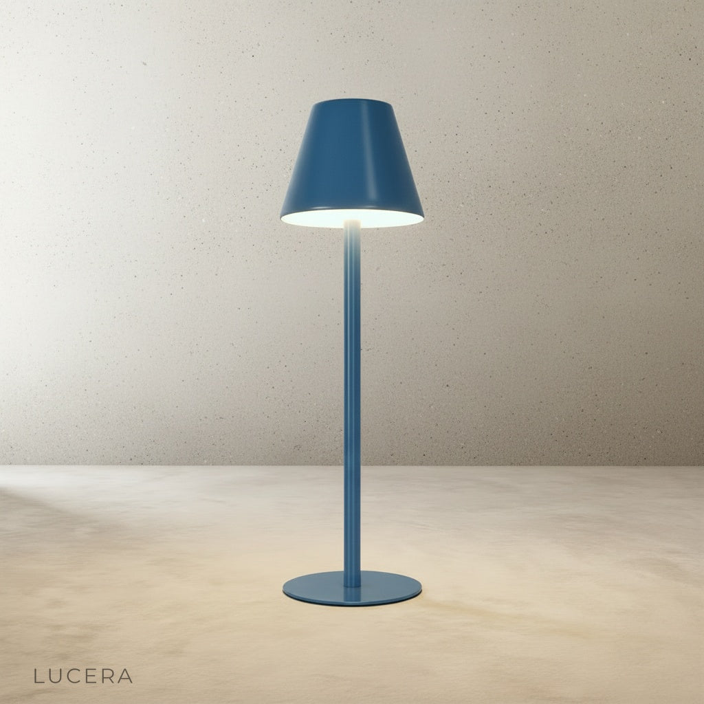 studio shot of yellow table lamp from above showing circular base and shade