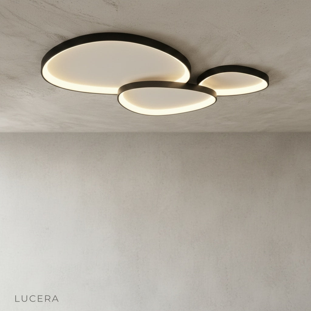 yurt ceiling light casting soft evening glow over a stylish bedroom with wooden accents