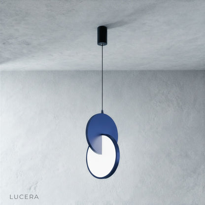 angled view of modern pendant light showing depth between aluminum rings and translucent acrylic