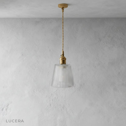 Harmony Pendant Light with adjustable cord at different heights in bright airy bedroom
