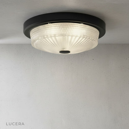 Veneration ceiling light above dining table in stylish kitchen creating inviting atmosphere for meals