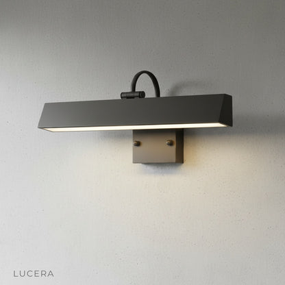 Detail shot of Quiete lamp's push switch and seamless metal-acrylic joint