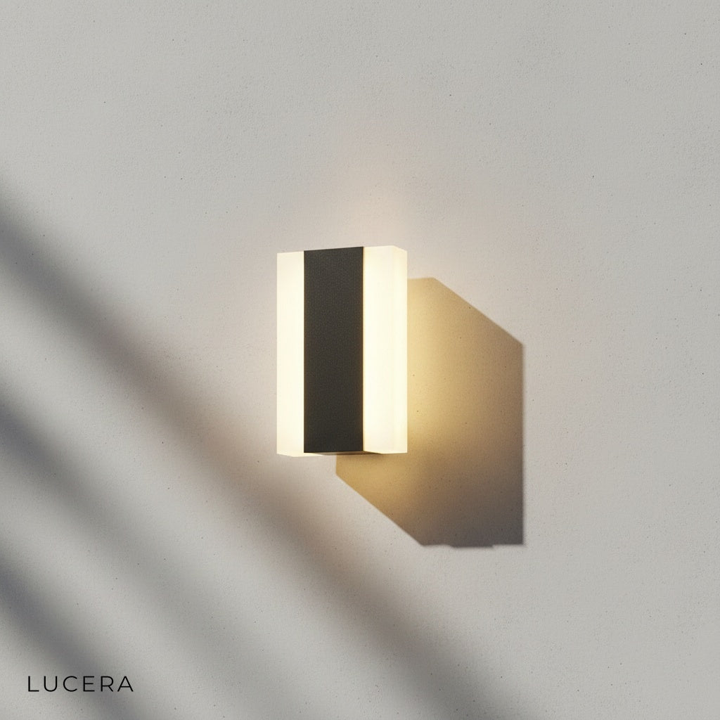 nighttime shot of the outdoor lamp highlighting textured iron finish