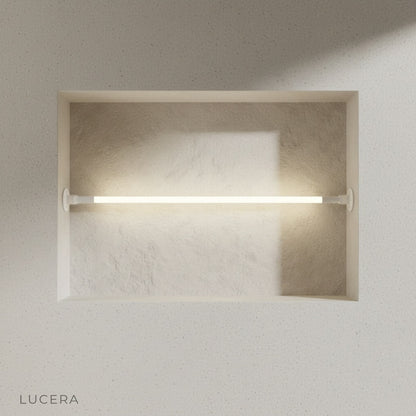 Nab wall lamp in contemporary lounge with sculptural silhouette