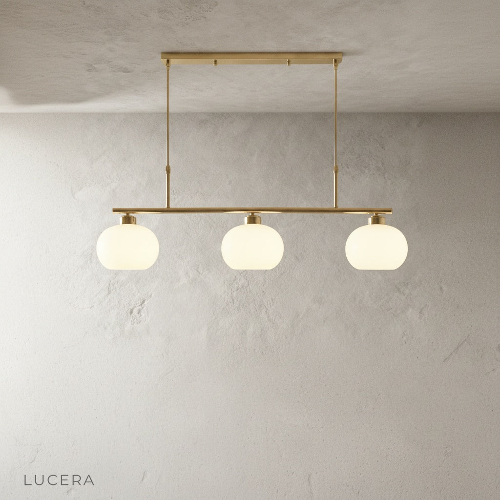 Tempo Chandelier hanging above a rustic wooden table, blending modern metal with natural textures